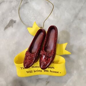 Wizard of Oz Christmas ornaments.  One is musical.